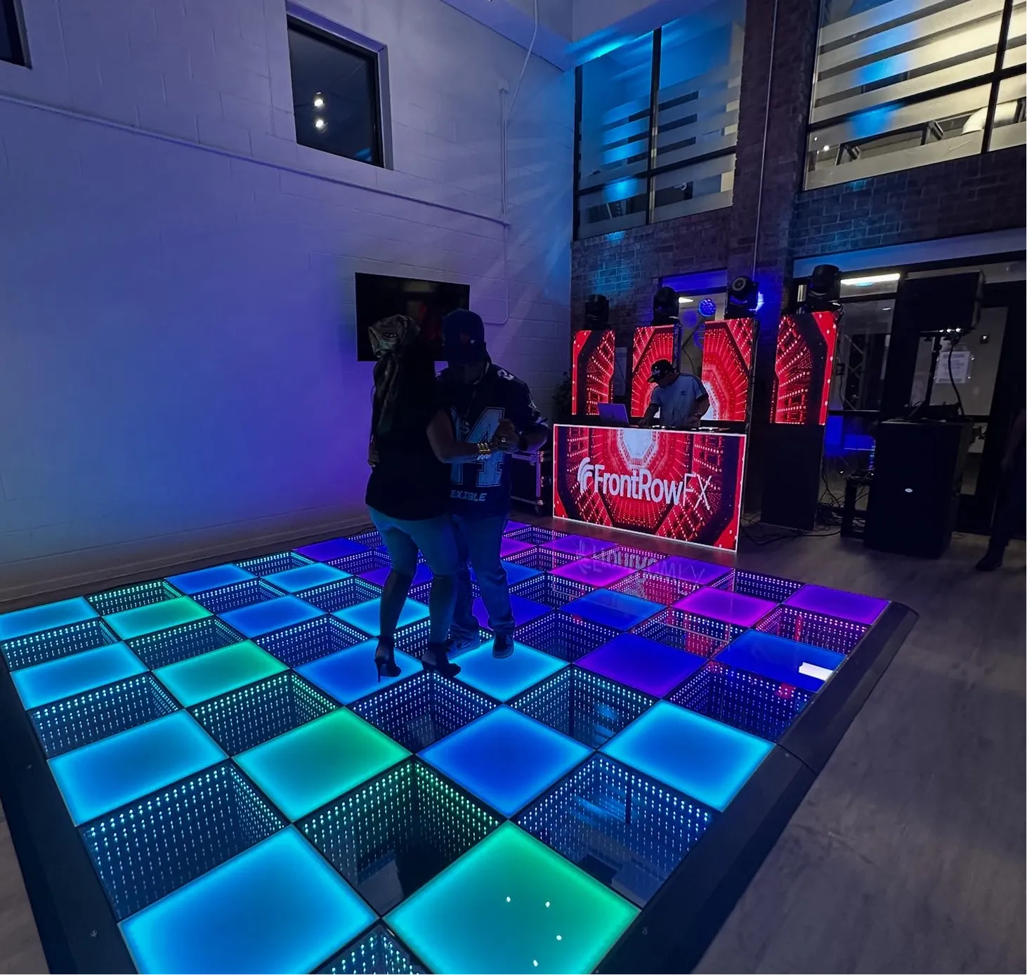 Front Row FX event production Minneapolis with LED dance floor, LED screens, lighting, sound, DJ and LED robot shows for weddings, quinceaneras, corporate and cultural events in Minnesota.