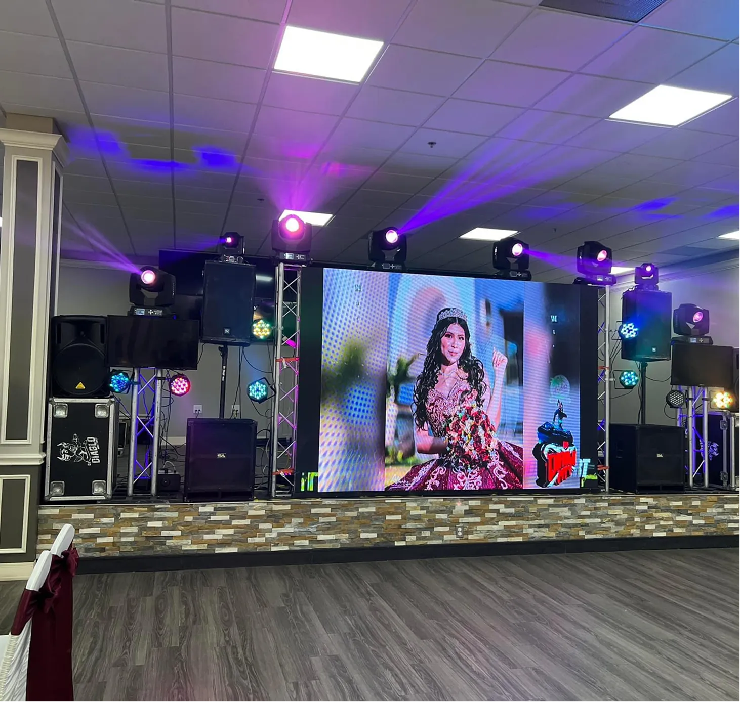 Front Row FX event production Minneapolis with LED dance floor, LED screens, lighting, sound, DJ and LED robot shows for weddings, quinceaneras, corporate and cultural events in Minnesota.