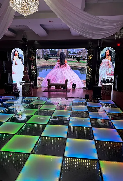 Front Row FX event production Minneapolis with LED dance floor, LED screens, lighting, sound, DJ and LED robot shows for weddings, quinceaneras, corporate and cultural events in Minnesota.