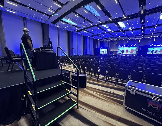 Front Row FX event production Minneapolis with LED dance floor, LED screens, lighting, sound, DJ and LED robot shows for weddings, quinceaneras, corporate and cultural events in Minnesota.