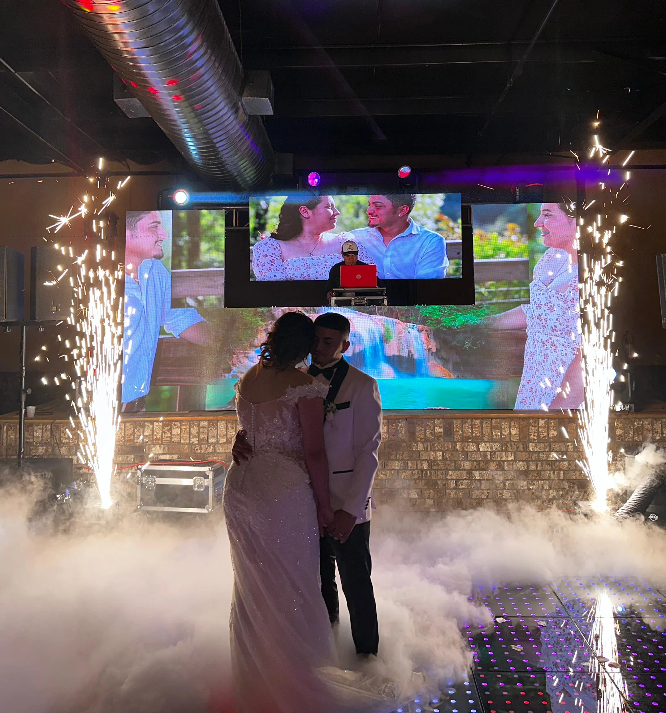 Event production Minneapolis with LED dance floor, LED screens, lighting, sound, DJ and LED robot shows for weddings, quinceaneras, corporate and cultural events in Minnesota.
