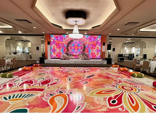 Event production Minneapolis with LED dance floor, LED screens, lighting, sound, DJ and LED robot shows for weddings, quinceaneras, corporate and cultural events in Minnesota.