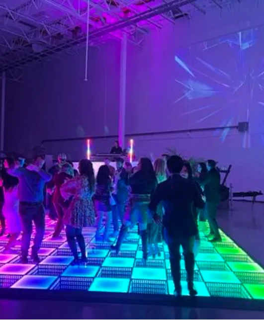 Event production Minneapolis with LED dance floor, LED screens, lighting, sound, DJ and LED robot shows for weddings, quinceaneras, corporate and cultural events in Minnesota.