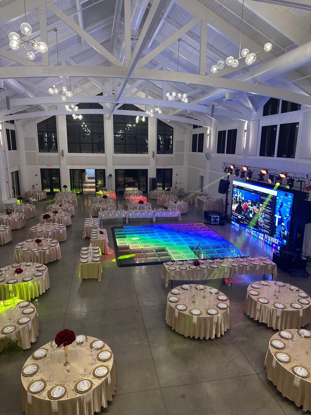 Luxury wedding setup with LED dance floor, LED screen wall and professional lighting by Front Row FX in Minnesota