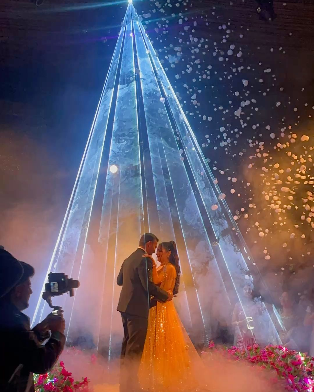 Luxury wedding first dance with LED screen pyramid, cold sparklers and low fog by Front Row FX in Minnesota