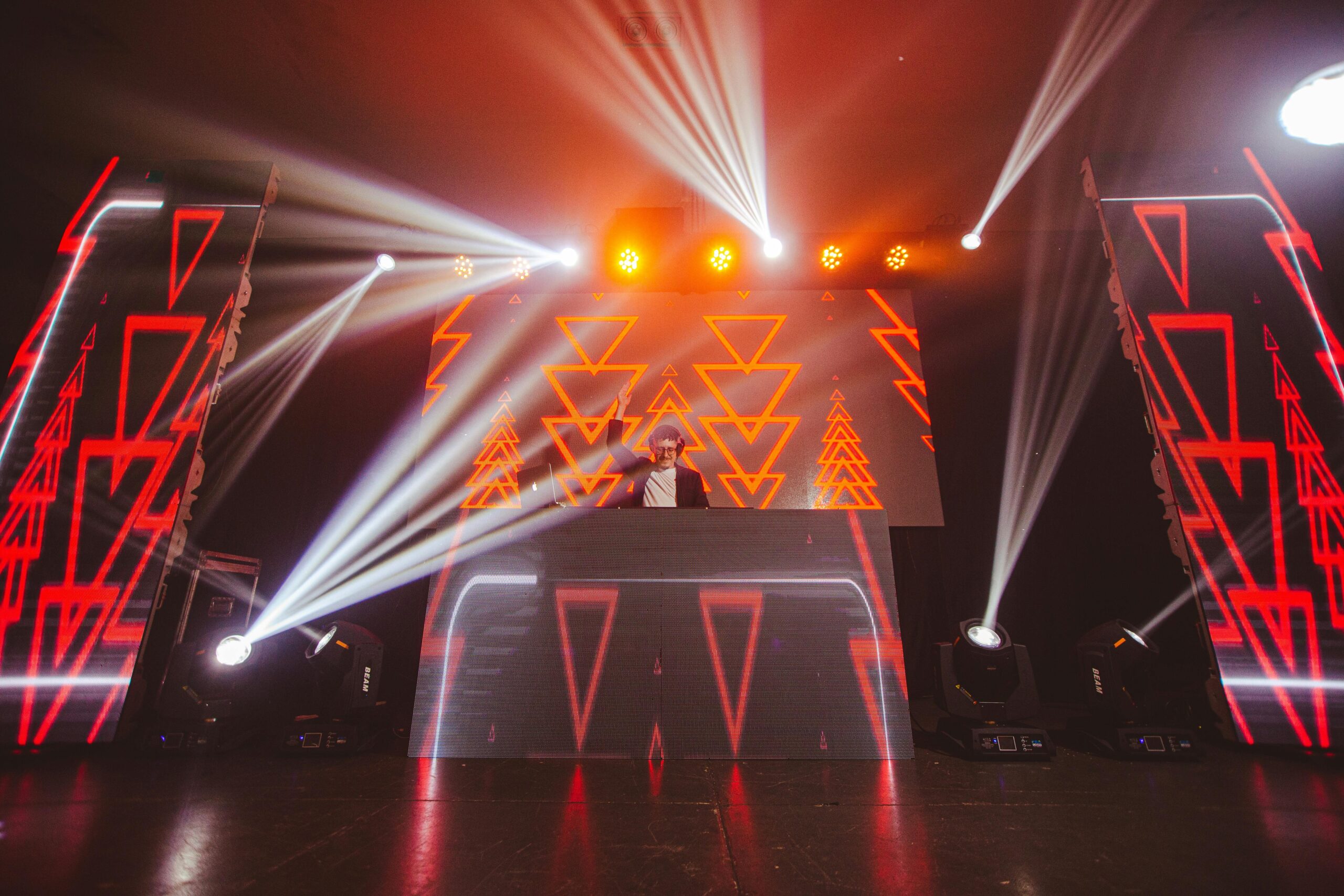 Professional DJ setup with LED screen visuals, stage lighting and immersive event production by Front Row FX